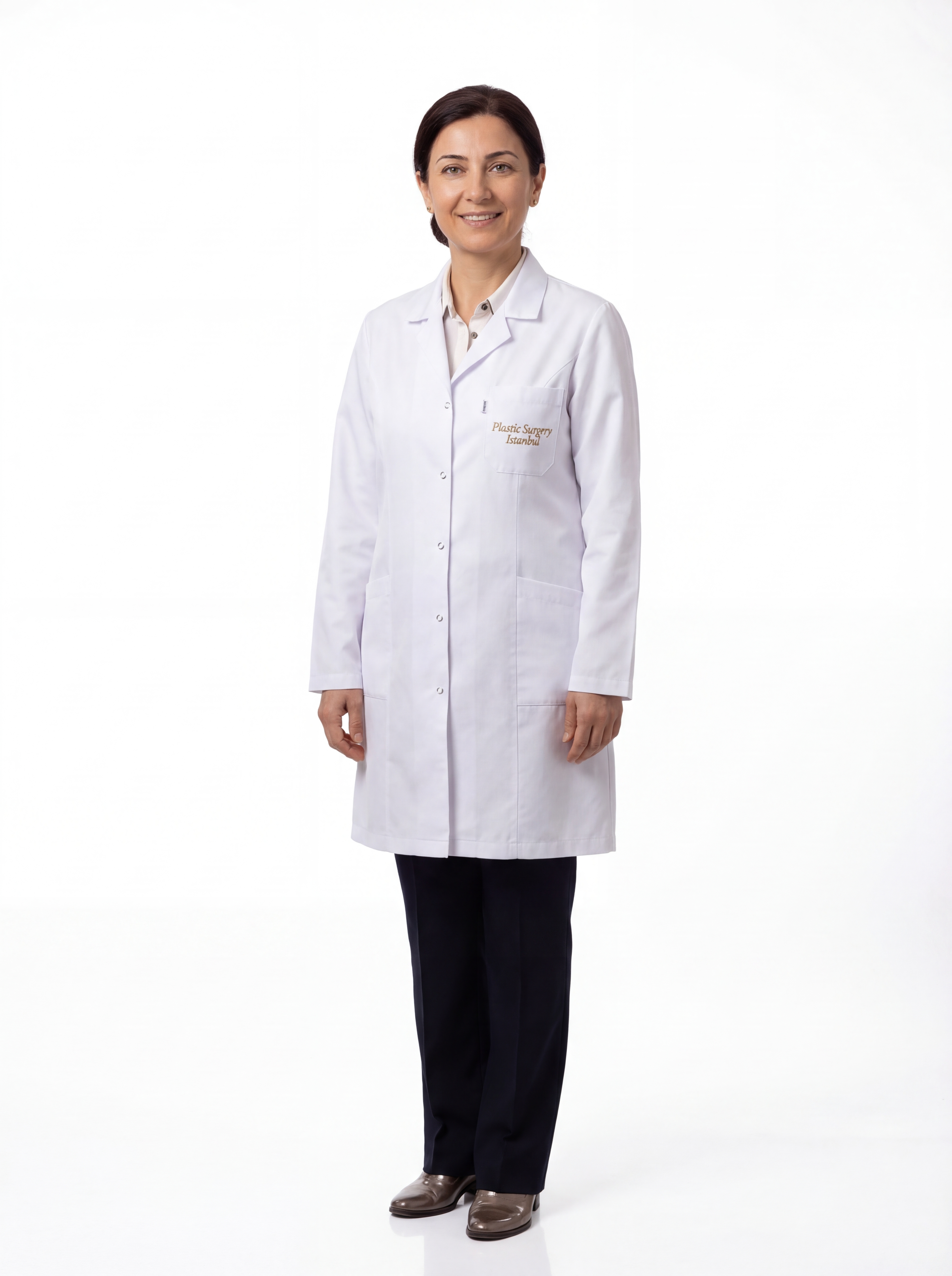 Assoc. Prof. Dr. Ayşe Nil Erdem — breast augmentation specialist in Istanbul Turkey, wearing clinical coat